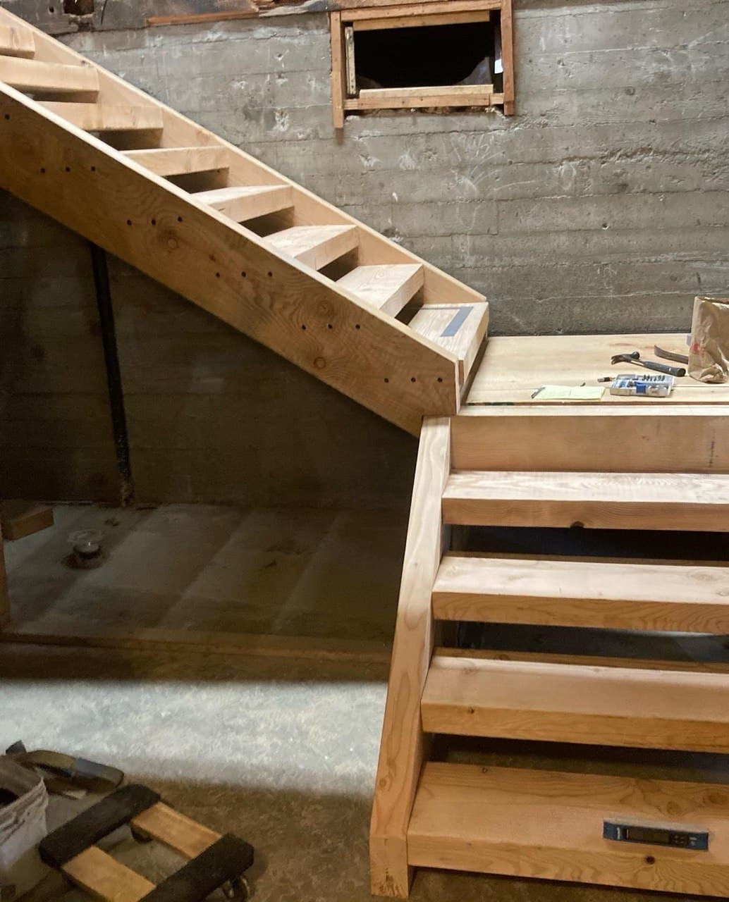 Newly framed replacement staircase during a basement stair replacement — Stumptown Stairs, Portland, OR